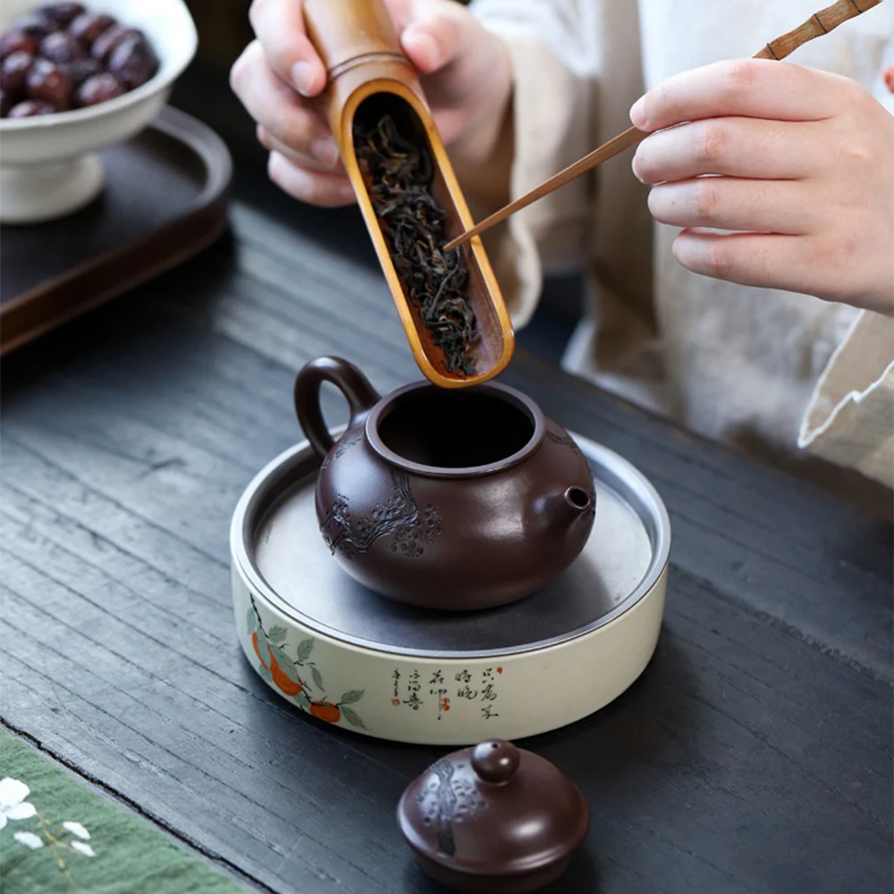 Yixing Purple Clay Plum Blossom Teapot - Image 5
